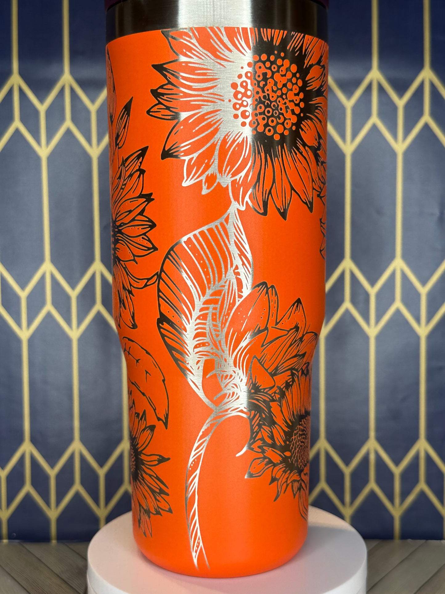 a close up of a cup on a wall